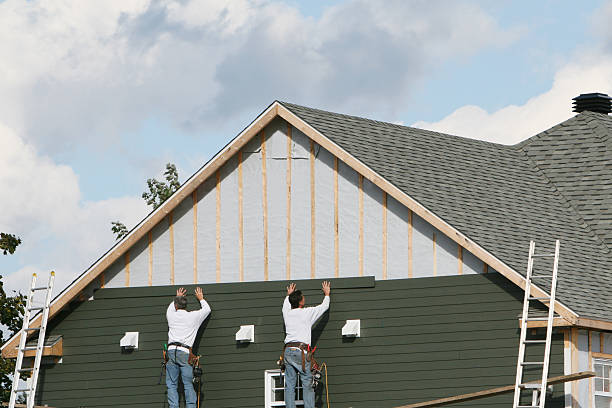 Professional Emergency Siding Repair technician working in De Graff, OH